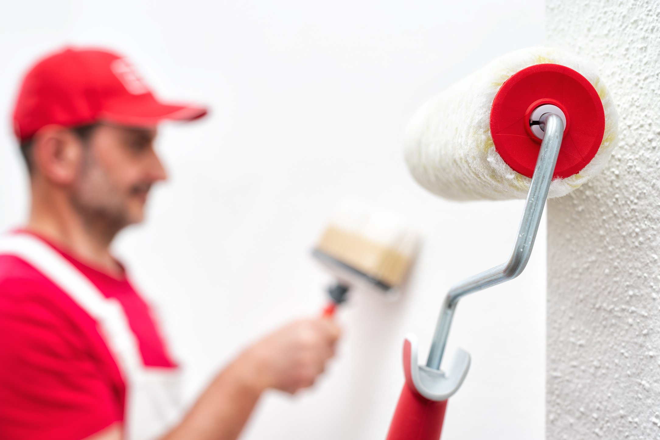 House painter, roller for painting. Building.